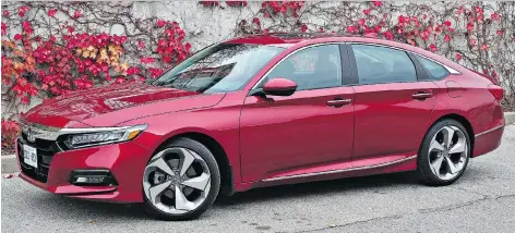  ?? CHRIS BALCERAK/DRIVING ?? The 2018 Honda Accord 1.5T blends a stylish interior with an eye-catching exterior on an excellent chassis.