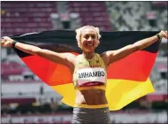 ?? MARTIN MEISSNER — THE ASSOCIATED PRESS ?? Malaika Mihambo, of Germany celebrates after winning the gold medal in the women’s long jump final at the 2020 Summer Olympics, Tuesday, Aug. 3, 2021, in Tokyo, Japan.