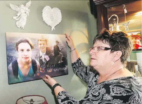  ?? NICK BRANCACCIO ?? Kim Gauthier with a collage of photos of her son Chance Gauthier, who was shot and killed in an alley near Church Street last February. Thanks to community donations, a new batting cage for Windsor Central Little League at Memorial Park will be named after Chance.