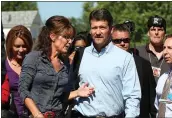  ?? THE ASSOCIATED PRESS ?? Sarah and Todd Palin may be seeking a divorce. The papers, which provide only initials, were filed Friday by TMP against SLP. Todd Palin’s middle name is Mitchell and Sarah Palin’s middle name is Louise.