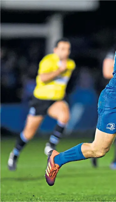  ??  ?? Decisive move: Jordan Larmour sets off on his run to score Leinster’s winning try