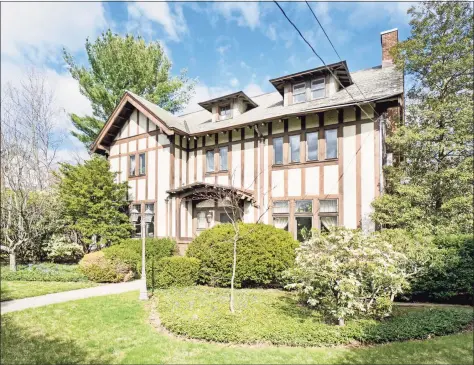  ?? Contribute­d photo ?? This historic Tudor Revival features luminous original wood floors, beams, and nine-foot ceilings, plus many light-flooded windows.