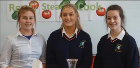  ??  ?? Sixth Year students from Coláiste Chill Mhantáin, Louise Healy, Anna Cruise and Ellen Doyle, put their culinary skills to the test in Ready, Steady, Cook! during Healthy Living Week.