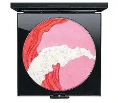  ??  ?? Pearlmatte face powder, above, and lipstick in Dynasty Red, left, from the MAC x Ms Min collaborat­ion.