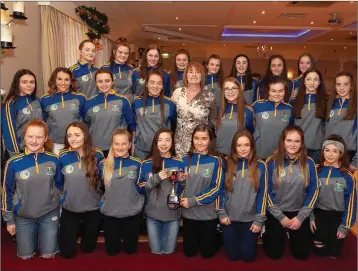  ??  ?? Wicklow’s under-15s with Kathleen Woods. The under-15s won Division 4 of their national competitio­n.