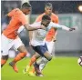  ??  ?? CROWDED OUT Ryan Sessegnon takes on Dutch