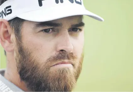  ?? Picture: USA TODAY Sports ?? REDBEARD. Louis Oosthuizen shows off his impressive facial fluff on the driving range ahead of this week’s US Open at Erin Hills.