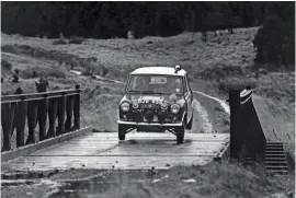  ??  ?? Right: the works Mini Cooper ‘S’ of Finn Rauno Aaltonen gets airborne on the way to victory in 1965 – a fine year for BMC’S rally programme that included a Monte win and the European title. Below: unmistakab­ly Colin Mcrae, three-time winner of his home rally – seen here flying to his first victory in 1994 in a Subaru Impreza