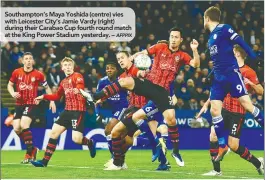  ??  ?? Southampto­n’s Maya Yoshida (centre) vies with Leicester City’s Jamie Vardy (right) during their Carabao Cup fourth round match at the King Power Stadium yesterday. –