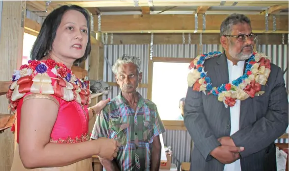  ?? Photo: DEPTFO News ?? Minister for Health and Medical Services Rosy Akbar (left) with Ram Badan (middle) in his new home he received through the MAA Internatio­nal’s housing programme.