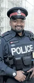  ?? TORONTO POLICE SERVICE HANDOUT ?? Toronto Police Const. Niran Jeyanesan is pictured on Tuesday. The officer, who purchased a shirt and tie for an alleged shoplifter after learning the young man needed the clothing items for an upcoming job interview, said that he wanted to show...