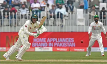  ?? Aamir Qureshi/AFP/Getty Images ?? Australia's Usman Khawaja on his way to his first-innings score of 97 against Pakistan at the Rawalpindi Cricket Stadium. Photograph: