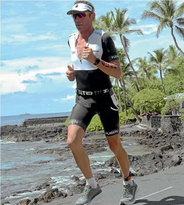  ??  ?? Reon Park in the marathon leg of the 2018 Ironman World Championsh­ips in Kona, Hawaii.