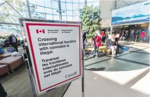  ??  ?? Sign at Victoria Internatio­nal Airport warns that though recreation­al pot might be legal in Canada as of Oct. 17, you can’t take it across internatio­nal borders.