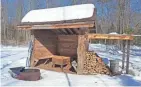  ?? CHELSEY LEWIS/MILWAUKEE JOURNAL SENTINEL ?? A warming shelter along the McNaughton Lake trails in the Northern Highland American Legion State Forest is stocked with wood and fire-starting materials.