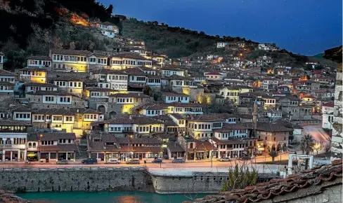  ??  ?? A view of Berat, a historic city in the south of Albania, at night.