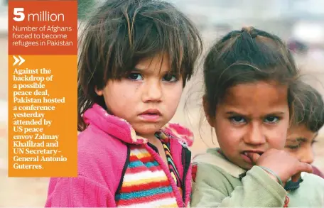  ?? AP ?? Afghan refugee children who fled their country, walk in the Kabobayan refugee camp, Peshawar, Pakistan. After 40 years, more than 1. 5 million Afghans still live as refugees in Pakistan, feeling abandoned by their own government.