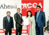  ?? ?? Ms. Nilusha Ranasinghe Head of South Asia ACCA exchanging the MOU with CA Maldives President /Auditor General Mr. Hussain Niyazy. Also in the picture is the Chairman Member Network panel ACCA Sri Lanka Mr. Nandika Budhipala and Vice-President of CA Maldives, Mr. Hasan Mohomed