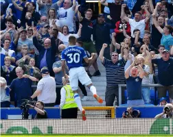  ??  ?? Top right Savouring his stunner against United