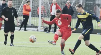  ??  ?? Victoria Gardens (red) take on Ryhope Foresters last week.