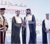  ?? Supplied photo ?? Shaikh Humaid awarding graduates of GMC, as Shaikh Nahyan looks on. —