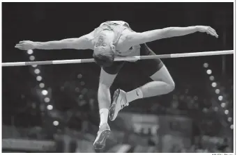  ?? AP File Photo ?? Russia’s Danil Lysenko makes an attempt in the men’s high jump final at the World Athletics Indoor Championsh­ips in Birmingham, England, on March 1, 2018. The president of Russia’s track and field federation Dmitry Shlyakhtin was suspended on Thursday on suspicion of obstructin­g an anti-doping investigat­ion related to Lysenko, who allegedly presented fake medical records.