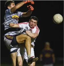  ??  ?? Wexford keeper Conor Swaine clashes with Conall McKeever.