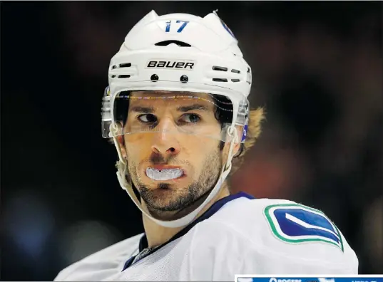  ??  ?? Ryan Kesler had more than his mouth guard to chew on Monday after hearing some of Alain Vigneault’s comments.