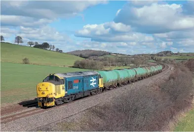  ?? Paul Waring ?? Operated by Loram UK, 37418 An Comunn Gaidhealac­h heads through South Wingfield on March 7, working the 09.45 Gascoigne Wood Sidings to Lydney, transferri­ng 11 TTA wagons into preservati­on on the Dean Forest Railway.