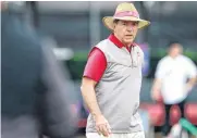  ?? [AP PHOTO] ?? Nick Saban walks through an Alabama practice Thursday in Miami Shores, Florida.