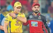  ?? PTI ?? CSK skipper MS Dhoni with RCB counterpar­t Virat Kohli.