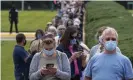  ?? Photograph: Tasos Katopodis/Getty Images ?? People line up to vote early at the Fairfax Government Center in Fairfax, Virginia.