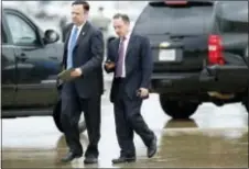 ?? ALEX BRANDON - THE ASSOCIATED PRESS ?? White House Director of Social Media Dan Scavino, left, walks with former White House Chief of Staff Reince Priebus as they arrive Friday at Andrews Air Force Base, Md. Trump says Homeland Secretary Secretary John Kelly is his new White House chief of...