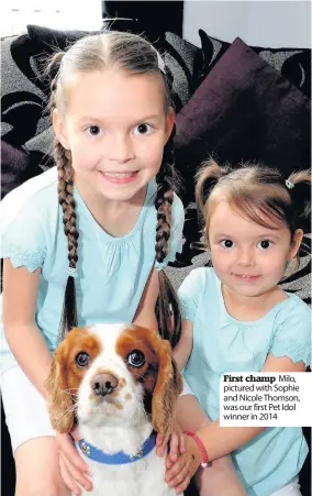  ??  ?? First champ Milo, pictured with Sophie and Nicole Thomson, was our first Pet Idol winner in 2014