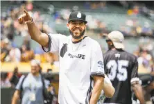  ?? Nicole Boliaux / The Chronicle ?? JaVale McGee, here waving to fans during his charity softball game at the Oakland Coliseum last month, was expected to hear the Kings’ contract pitch Thursday night.