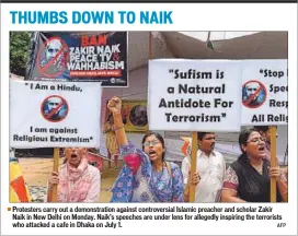  ??  ?? Protesters carry out a demonstrat­ion against controvers­ial Islamic preacher and scholar Zakir
Naik in New Delhi on Monday. Naik’s speeches are under lens for allegedly inspiring the terrorists who attacked a cafe in Dhaka on July 1. AFP