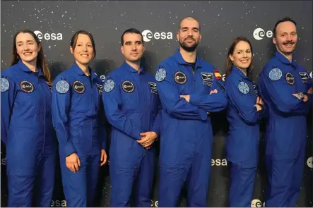  ?? MARTIN MEISSNER — THE ASSOCIATED PRESS ?? From left, Rosemary Cooga of Britain, Sophie Adenot of France, Raphael Liegeois of Belgium, Pablo Alvarez Fernandez of Spain, Katherine Bennell-Pegg of Australia and Marco Sieber of Switzerlan­d, pose for a family photo at the graduation ceremony of astronaut candidates of the Class of 2022at the European Astronaut Centre in Cologne, Germany, April 22. The new ESA astronauts took up duty at the European Astronaut Centre one year ago to be trained to the highest level of standards as specified by the Internatio­nal Space Station partners. Also concluding a year of astronaut basic training is Australian astronaut candidate Katherine Bennell-Pegg, who has trained alongside ESA’s candidates.