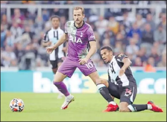 ?? Picture: REUTERS ?? Tottenham Hotspur’s Harry Kane, left, in action with Newcastle United’s Isaac Hayden during their Premier League match on Monday.