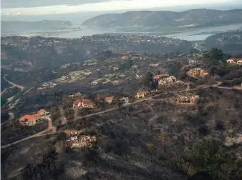  ?? Photos: Patrick Ryan/Vulcan Wildfire Media ?? The Knysna Heights area with a view towards the Heads after the fires.