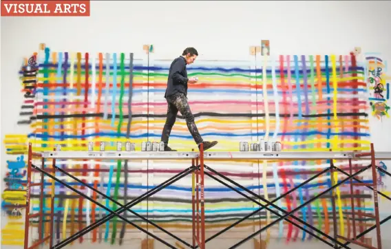  ?? Nicole Boliaux / The Chronicle 2017 ?? Alicia McCarthy, seen working on a piece on plexiglas for her 2017 exhibit at the San Francisco Museum of Modern Art, is joining with her longtime friend Ruby Neri for a new exhibit at Berkeley Art Museum and Pacific Film Archive. The two were members of the “Mission School” art scene in the 1990s.