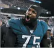  ?? MICHAEL PEREZ — THE ASSOCIATED PRESS ?? Philadelph­ia Eagles’ Vinny Curry celebrates after defeating the Dallas Cowboys 17-9 Sunday in Philadelph­ia.