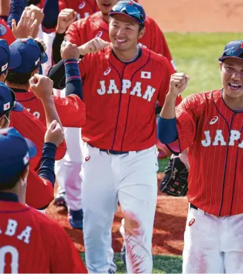  ?? Foto: Watanabe, Getty ?? Gute Stimmung im japanische­n Baseball team nach ihrem 7:4 Sieg gegen Mexiko.