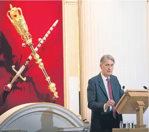 ?? Picture: PA. ?? Chancellor Philip Hammond delivers his speech.