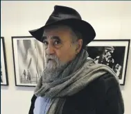  ??  ?? Above, Abbas at an exhibition of his work at the Islamic Institute of Culture in Paris, November 2013 AFP
