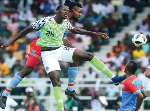  ??  ?? Simy contests for an aerial ball on his Nigeria debut against DR Congo