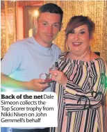  ??  ?? Back of the netDale Simeon collects the Top Scorer trophy from Nikki Niven on John Gemmell’s behalf