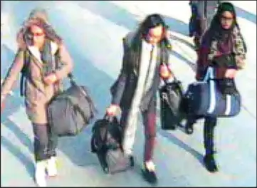  ??  ?? Fleeing to Syria: Amira Abase, Kadiza Sultana and Shamima Begum at Gatwick in February