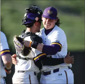  ?? TOM SILKNITTER - FOR MEDIA NEWS GROUP ?? Catcher Darius Troche and pitcher Ben Jones celebrate after Game 2of West Chester’s doublehead­er sweep of Bloomsburg on Sunday.