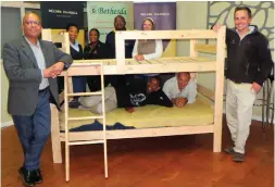  ??  ?? Standing, from left: David Alexander, (acting campus principal, NMU), Nandipha Pupuma (MTO), Sharon Xipu (SANParks), Sefoko Ramoshaba (NMU), Elani de Vrye (Bethesda) and Carlo de Kock (SANParks). Lying on the bed are Lisakhanya Ndovela, (NMU) and Richard Miller (NMU).