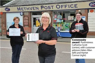  ??  ?? Community award Postmistre­ss Catherine Scott (centre), with customer advisors Helen Allan (left) and Harriet Connor (right)